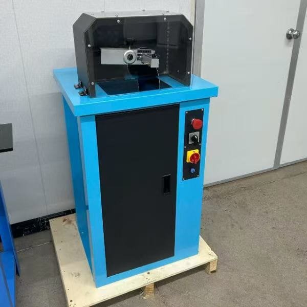 Detailed view of hose skiving machine parts